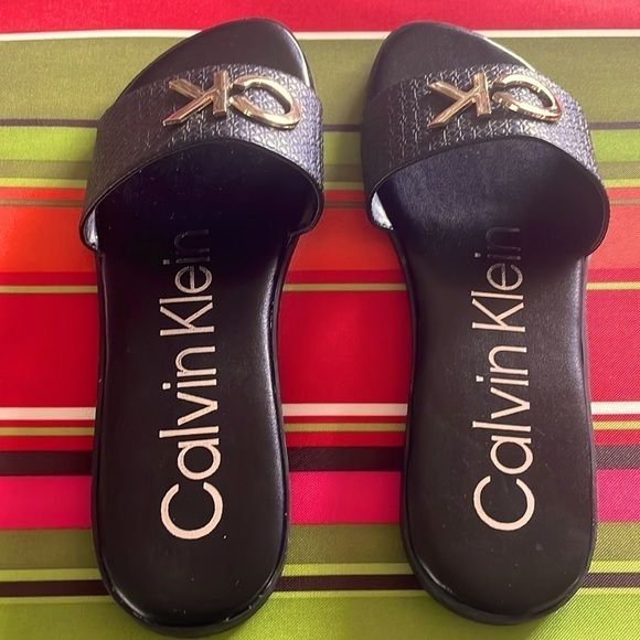 Brand New Calvin Klein Black Large Strap Sandals Flats w/ Gold Tone Metal Logo - Picture 6 of 12